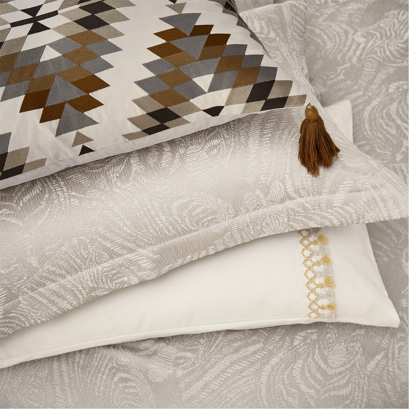 Harlequin NIRMALA TASSEL STANDARD PILLOWCASES Charcoal House of