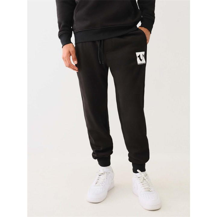 TRUE RELIGION STUDDED REGISTERED ICON JOGGING BOTTOMS MENS