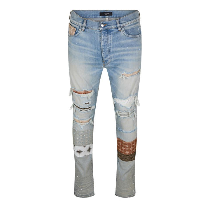 AMIRI DISTRESSED SKINNY JEANS